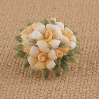 FLORES LARANJA EM PORCELANA