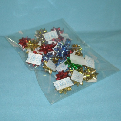 SAQUETA CELOFANE C/ PALA...